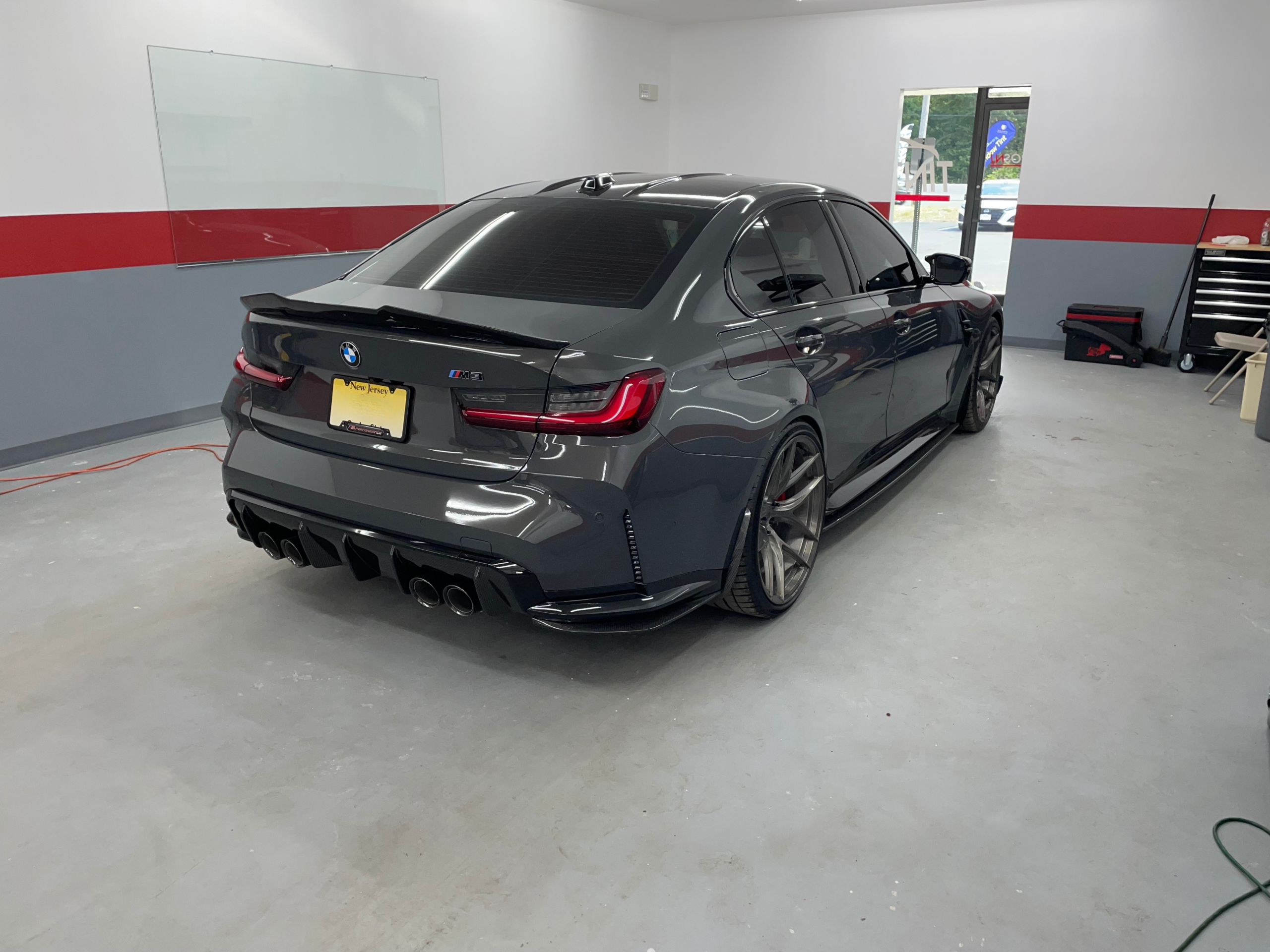 Gray BMW M3 with dark window tinting installed in Port Monmouth NJ tint shop